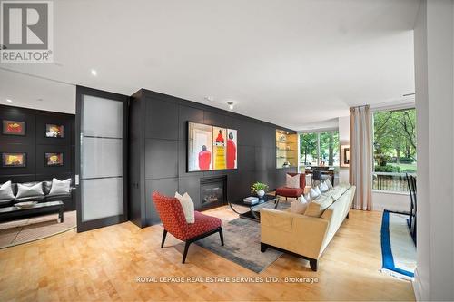 104 - 20 Scrivener Square, Toronto, ON - Indoor Photo Showing Living Room With Fireplace