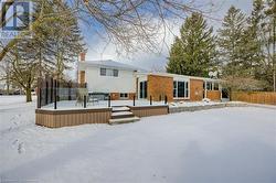 View of front facade featuring a deck - 