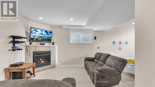 193 Tanoak Drive, London, ON - Indoor With Fireplace