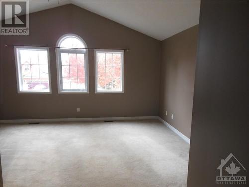 Large, bright primary bedroom with vaulted ceiling. - 101 Shirley'S Brook Drive, Ottawa, ON - Indoor Photo Showing Other Room