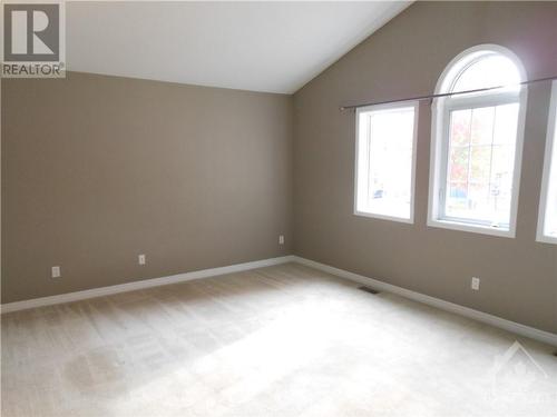 Large, bright primary bedroom with vaulted ceiling. - 101 Shirley'S Brook Drive, Ottawa, ON - Indoor Photo Showing Other Room