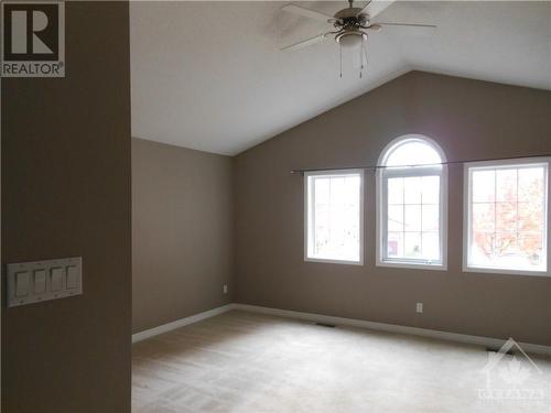 Large, bright primary bedroom with vaulted ceiling and ceiling fan. - 101 Shirley'S Brook Drive, Ottawa, ON - Indoor Photo Showing Other Room