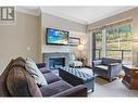 2950 Camozzi Road Unit# 2427, Revelstoke, BC  - Indoor Photo Showing Living Room With Fireplace 