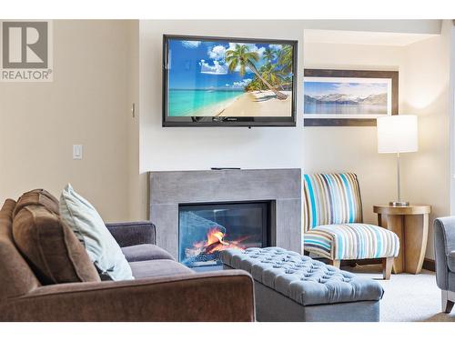 2950 Camozzi Road Unit# 2427, Revelstoke, BC - Indoor Photo Showing Living Room With Fireplace