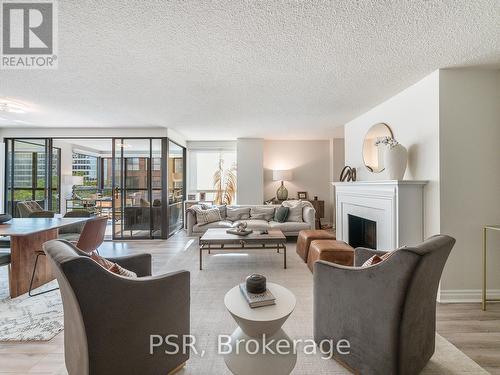 602 - 164 Cumberland Street, Toronto, ON - Indoor Photo Showing Living Room With Fireplace