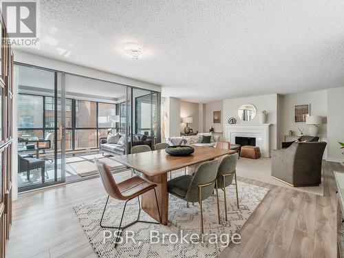 602 - 164 Cumberland Street, Toronto, ON - Indoor Photo Showing Dining Room With Fireplace