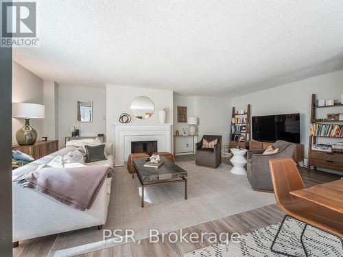 602 - 164 Cumberland Street, Toronto, ON - Indoor Photo Showing Living Room With Fireplace