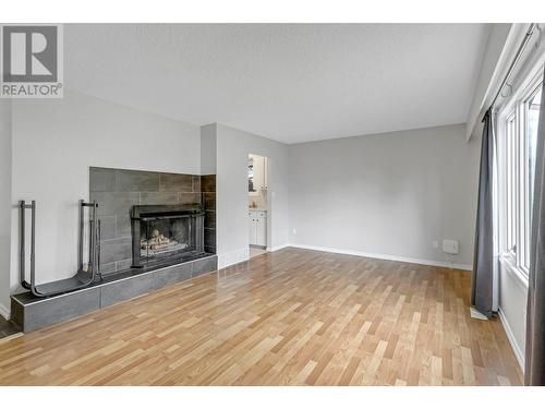 7645 Kingsley Crescent, Prince George, BC - Indoor Photo Showing Living Room With Fireplace