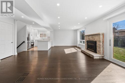 Mn & Bs - 194 Romfield Circuit, Markham, ON - Indoor Photo Showing Living Room With Fireplace