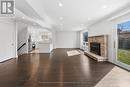 Mn & Bs - 194 Romfield Circuit, Markham, ON  - Indoor Photo Showing Living Room With Fireplace 