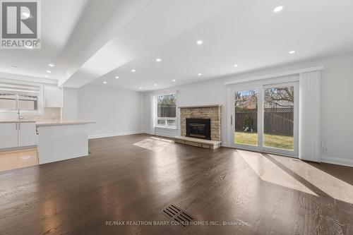 Mn & Bs - 194 Romfield Circuit, Markham, ON - Indoor Photo Showing Living Room With Fireplace