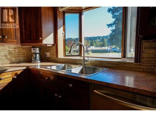 2697 Shoreacres  Road, Castlegar, BC - Indoor Photo Showing Kitchen With Double Sink