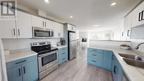 8404 85 Avenue, Fort St. John, BC - Indoor Photo Showing Kitchen With Double Sink