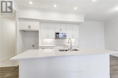 101 - 1880 Gordon Street, Guelph, ON - Indoor Photo Showing Kitchen With Double Sink