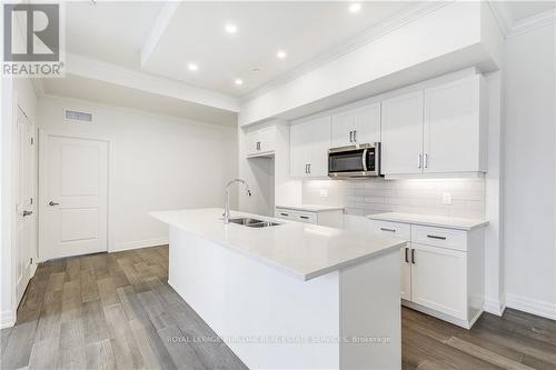 101 - 1880 Gordon Street, Guelph, ON - Indoor Photo Showing Kitchen With Double Sink