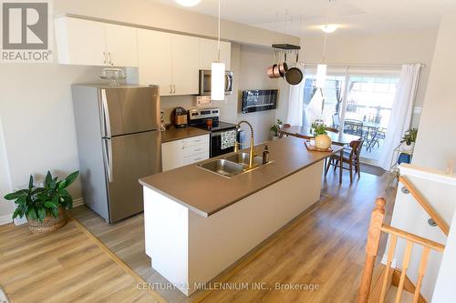 123 Sandhill Crane Drive, Wasaga Beach, ON - Indoor Photo Showing Kitchen With Stainless Steel Kitchen With Double Sink