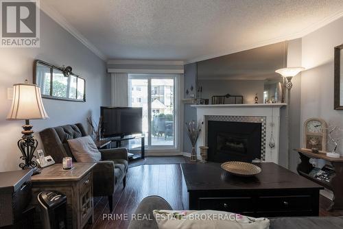 111 - 735 Deveron Crescent, London, ON - Indoor Photo Showing Living Room With Fireplace