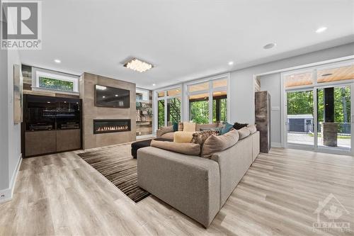 144 Derbeyshire Street, Ottawa, ON - Indoor Photo Showing Living Room With Fireplace