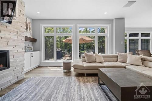 144 Derbeyshire Street, Ottawa, ON - Indoor Photo Showing Living Room With Fireplace