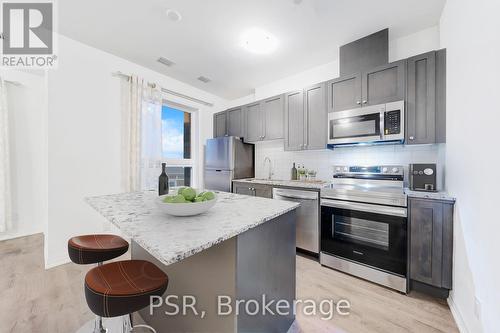 202 - 3285 Carding Mill Trail, Oakville, ON - Indoor Photo Showing Kitchen With Stainless Steel Kitchen With Upgraded Kitchen