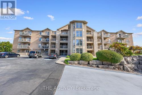 102 - 1810 Walkers Line, Burlington, ON - Outdoor With Facade