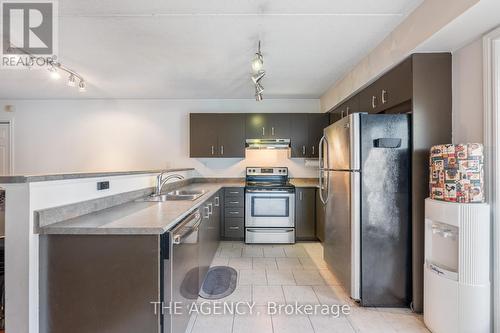 102 - 1810 Walkers Line, Burlington, ON - Indoor Photo Showing Kitchen With Double Sink