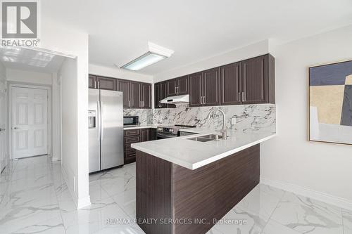 17 Macdougall Drive, Brampton, ON - Indoor Photo Showing Kitchen With Double Sink