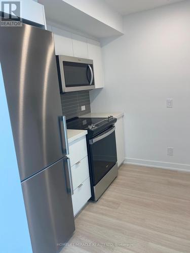 911 - 30 Tretti Way, Toronto, ON - Indoor Photo Showing Kitchen