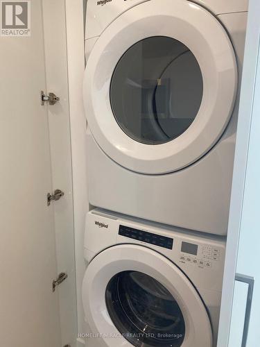 911 - 30 Tretti Way, Toronto, ON - Indoor Photo Showing Laundry Room