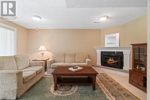 67 Snowcrest Avenue, Toronto, ON - Indoor Photo Showing Living Room With Fireplace