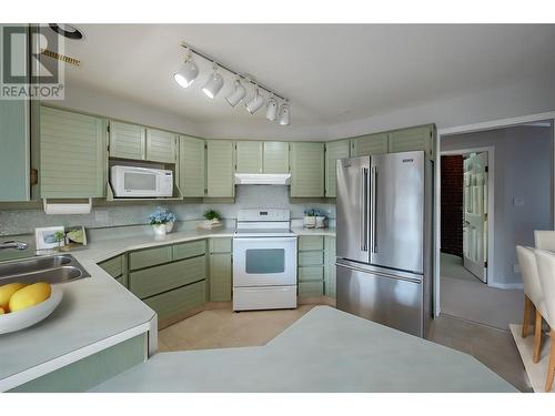 805 Comox Street Unit# 243, Penticton, BC - Indoor Photo Showing Kitchen With Double Sink