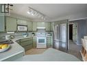 805 Comox Street Unit# 243, Penticton, BC  - Indoor Photo Showing Kitchen With Double Sink 