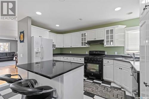 1407 Latrace Road, Saskatoon, SK - Indoor Photo Showing Kitchen With Double Sink