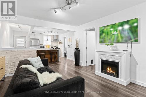 37 Maplecrest Avenue, St. Catharines, ON - Indoor Photo Showing Living Room With Fireplace