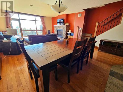 1301 Gerry Sorensen Way Unit# 19, Kimberley, BC - Indoor Photo Showing Dining Room With Fireplace