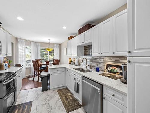 13-2021 Pacific Way, Kamloops, BC - Indoor Photo Showing Kitchen With Stainless Steel Kitchen With Double Sink With Upgraded Kitchen