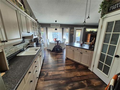 125 Durum Drive, Brandon, MB - Indoor Photo Showing Kitchen With Double Sink