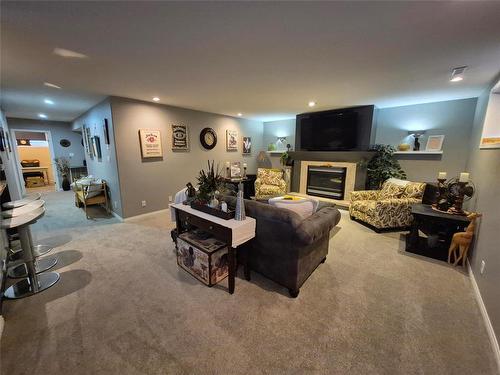 125 Durum Drive, Brandon, MB - Indoor With Fireplace