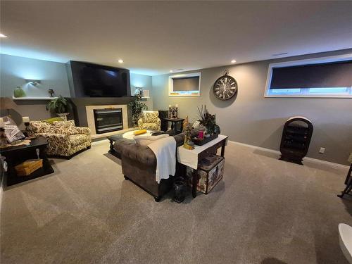 125 Durum Drive, Brandon, MB - Indoor Photo Showing Living Room With Fireplace