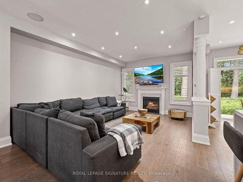 91 Upper Canada Crt, Halton Hills, ON - Indoor Photo Showing Living Room With Fireplace