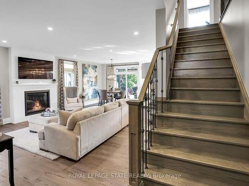 26A Baker Rd N, Grimsby, ON - Indoor Photo Showing Living Room With Fireplace