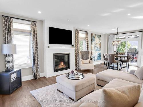 26A Baker Rd N, Grimsby, ON - Indoor Photo Showing Living Room With Fireplace