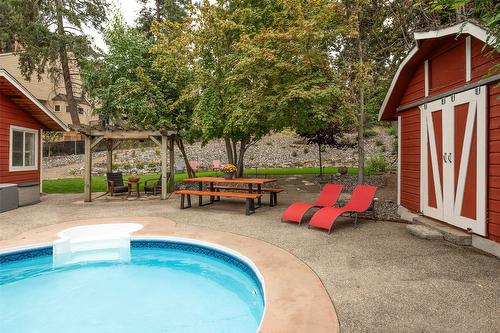 677 Drummond Court, Kelowna, BC - Outdoor With In Ground Pool With Backyard