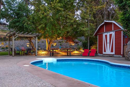 677 Drummond Court, Kelowna, BC - Outdoor With In Ground Pool With Backyard