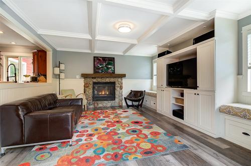 677 Drummond Court, Kelowna, BC - Indoor Photo Showing Living Room With Fireplace