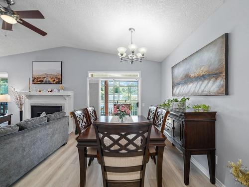 403-1234 Fort St, Victoria, BC - Indoor Photo Showing Dining Room With Fireplace