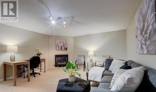 44 - 101 Brookside Street, London, ON - Indoor Photo Showing Living Room With Fireplace