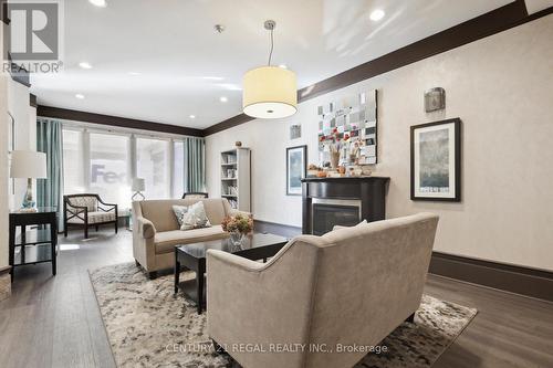 1603 - 67 Caroline Street, Hamilton, ON - Indoor Photo Showing Living Room With Fireplace