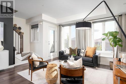 22 - 120 Twenty Fourth Street, Toronto, ON - Indoor Photo Showing Living Room