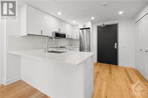 180 George Street Unit#1405, Ottawa, ON - Indoor Photo Showing Kitchen With Double Sink With Upgraded Kitchen